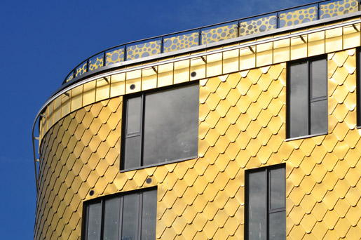 The Fold, Sidcup. Fish scale shingles in KME TECU Gold Copper Alloy Shingles