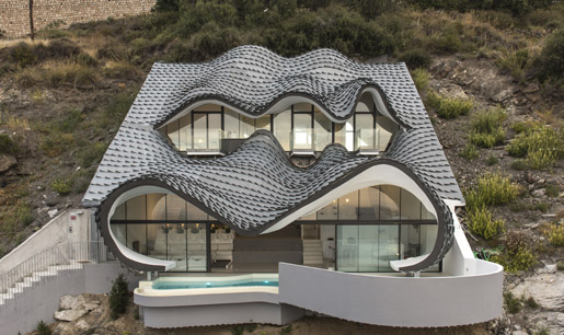 Zinc Shingles on a unique Cliff House in Salobrena