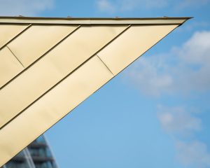 The Alchemist, Salford Quays – Cladding a Gold Folded Box