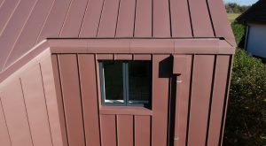 Hidden Box Eaves Gutter Detail Red Zinc Clad House