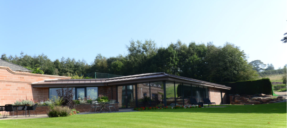 Zinc roof over a swimming pool in Cheshire - Garden Elevation